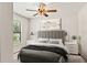 Serene bedroom with a queen-size bed and ceiling fan at 2820 N Central Ct, Tampa, FL 33602