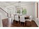 Bright dining room with large table and wood floors at 2820 N Central Ct, Tampa, FL 33602