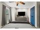 Elegant bedroom with a media console and stylish decor at 2820 N Central Ct, Tampa, FL 33602