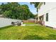 Spacious backyard with a firepit and seating area at 2820 N Central Ct, Tampa, FL 33602