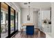 Kitchen nook with a blue island and sliding glass doors to the backyard at 2820 N Central Ct, Tampa, FL 33602