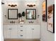 Modern double vanity bathroom with white cabinets and quartz countertops at 2820 N Central Ct, Tampa, FL 33602