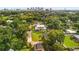 Aerial view of a house with a city skyline in the background at 2820 N Central Ct, Tampa, FL 33602