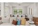 Bright dining room features a stylish light fixture and seating for six at 2820 N Central Ct, Tampa, FL 33602