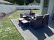 Backyard patio with a table and chairs set at 3118 Palm Ct, Dunedin, FL 34698