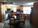 Updated kitchen features stainless steel appliances and light wood cabinets at 3118 Palm Ct, Dunedin, FL 34698