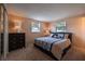 Spacious bedroom with king-size bed and dresser at 3118 Palm Ct, Dunedin, FL 34698