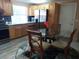 Updated kitchen with stainless steel appliances and light wood cabinets at 3118 Palm Ct, Dunedin, FL 34698
