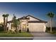 Beautiful single-Gathering home with a two-car garage, stone accents, and mature landscaping at 13714 Heartwood Way, Parrish, FL 34219