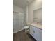 Clean bathroom with walk-in shower and single vanity at 7045 E 113Th Ct, Palmetto, FL 34221