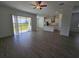 Spacious living area with sliding glass doors to backyard at 7045 E 113Th Ct, Palmetto, FL 34221