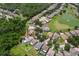 An aerial view of a house in a residential area, near a pond at 11154 Creek Haven Dr, Riverview, FL 33569