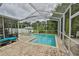 Inviting screened-in pool with brick pavers at 11154 Creek Haven Dr, Riverview, FL 33569