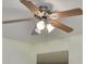 Modern ceiling fan with light kit, ideal for bedrooms or living areas at 11154 Creek Haven Dr, Riverview, FL 33569