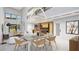 Open concept dining room with modern light fixtures at 8936 Williams Rd, Seffner, FL 33584