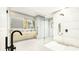 Elegant bathroom with double sinks, freestanding tub, and a glass shower at 8936 Williams Rd, Seffner, FL 33584