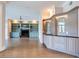 Gathering room with fireplace, built-in shelving, and hardwood floors at 2509 N Dundee St, Tampa, FL 33629