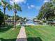 Scenic view of a canal with boats and lush landscaping at 2509 N Dundee St, Tampa, FL 33629