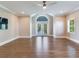Bedroom with hardwood floors, a ceiling fan, and French doors at 2509 N Dundee St, Tampa, FL 33629