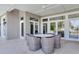 Outdoor patio with wicker furniture and view of the water at 2509 N Dundee St, Tampa, FL 33629
