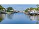 Calm canal with boats docked and luxurious homes at 2509 N Dundee St, Tampa, FL 33629