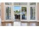 Waterfront view from the living room with patio furniture visible at 2509 N Dundee St, Tampa, FL 33629