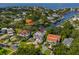 Aerial view of waterfront home with private dock and boat slips at 2509 N Dundee St, Tampa, FL 33629