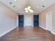 Spacious bedroom with built-in cabinets and hardwood floors at 2509 N Dundee St, Tampa, FL 33629