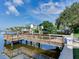 Wooden dock with steps leading to the water at 2509 N Dundee St, Tampa, FL 33629