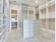 Large walk-in closet with ample shelving and drawers at 2509 N Dundee St, Tampa, FL 33629