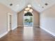 Bright bedroom with hardwood floors,water views, and a ceiling fan at 2509 N Dundee St, Tampa, FL 33629