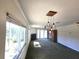 Spacious living room with fireplace and large windows at 346 Madeira Cir, St Petersburg, FL 33715