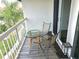 Balcony with table and chairs, offering a relaxing space at 346 Madeira Cir, St Petersburg, FL 33715