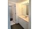 Bathroom with vanity, sink, mirror, and access to bedroom at 346 Madeira Cir, St Petersburg, FL 33715