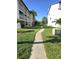 Paved pathway meandering through the community at 346 Madeira Cir, St Petersburg, FL 33715