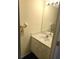 Small bathroom with vanity, sink, and mirror at 346 Madeira Cir, St Petersburg, FL 33715