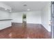 Open concept living area with hardwood floors at 7301 Pierce Harwell Rd, Plant City, FL 33565