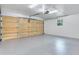 Bright and clean garage with freshly painted floor and walls at 7301 Pierce Harwell Rd, Plant City, FL 33565