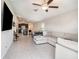 Open floor plan living room, kitchen and dining area at 16762 Delia St, Wimauma, FL 33598