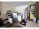 Garage with washer, dryer, water heater, and storage at 14942 Deer Meadow Dr, Lutz, FL 33559