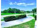 Landscaped yard with a view of a tree-lined street at 101 Park N St, St Petersburg, FL 33710