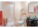 Clean bathroom with a shower, toilet, vanity with glass sink at 4950 Bayshore Blvd # 13C, Tampa, FL 33611