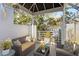 Relaxing patio with comfortable seating and views of lush greenery at 4950 Bayshore Blvd # 13C, Tampa, FL 33611