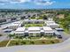 Aerial view of condo complex, showing its buildings and surrounding landscape at 4600 Marine Parkway # 104, New Port Richey, FL 34652