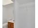 Clean bathroom with single sink vanity and a toilet at 4600 Marine Parkway # 104, New Port Richey, FL 34652