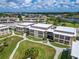 Aerial image of condo building and waterfront at 4600 Marine Parkway # 104, New Port Richey, FL 34652