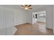 Living room featuring wood-look floors and an open layout at 4600 Marine Parkway # 104, New Port Richey, FL 34652