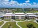 Community with lush landscaping and walkways at 4600 Marine Parkway # 104, New Port Richey, FL 34652