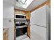 Kitchen boasts granite counters & stainless steel appliances at 4600 Marine Parkway # 104, New Port Richey, FL 34652