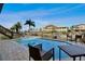 Enjoy this refreshing pool with patio furniture and canal views at 6241 Bayside Dr, New Port Richey, FL 34652